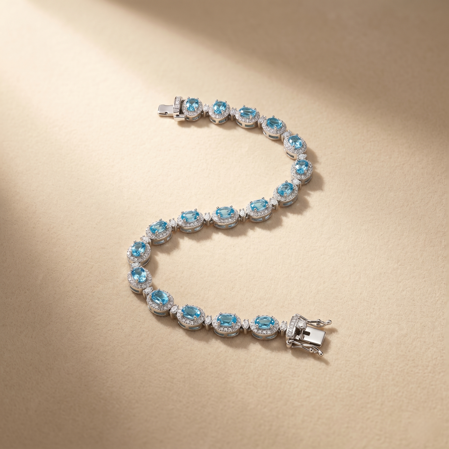 Elegant Blue Topaz Silver Halo Bracelet