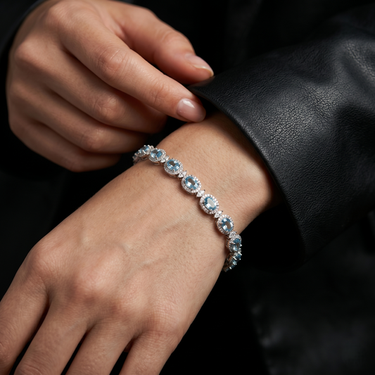 Elegant Blue Topaz Silver Halo Bracelet