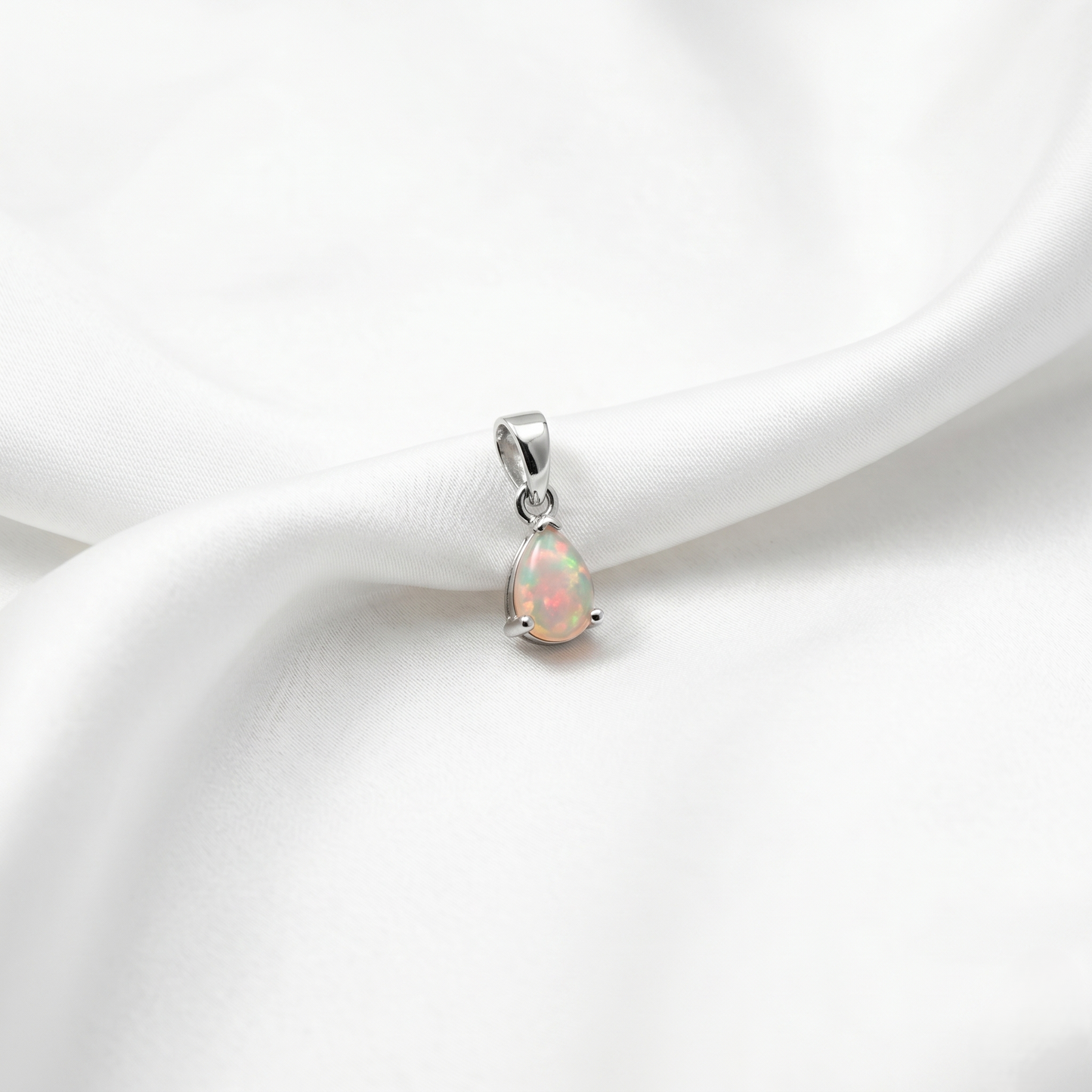Elegant Pear-Cut Natural Opal Silver Pendant