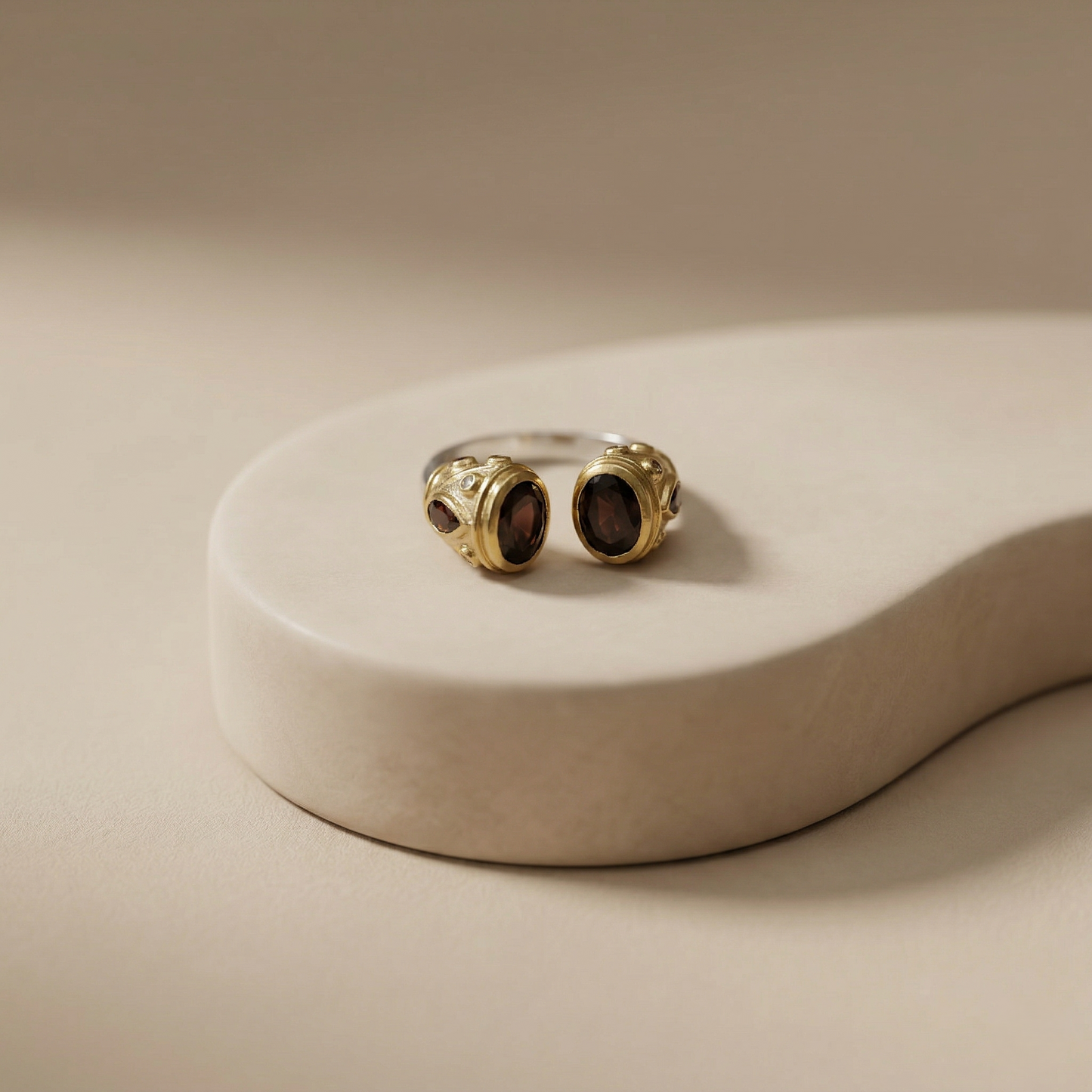 Elegant Silver Bypass Ring with Garnets