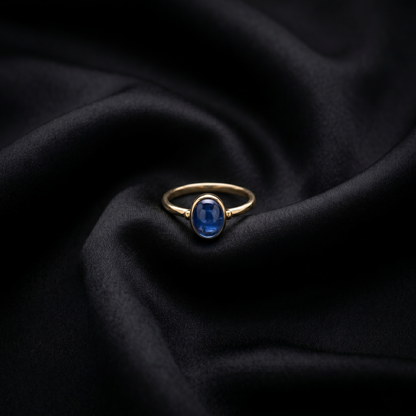 Oval Blue Cabochon Gold Solitaire Ring
