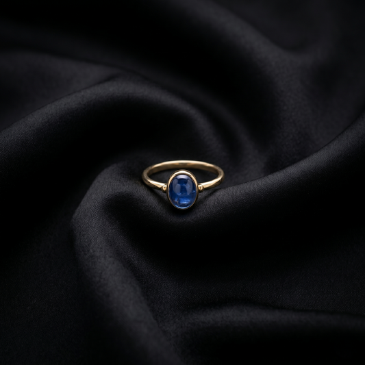 Oval Blue Cabochon Gold Solitaire Ring