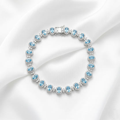 Elegant Blue Topaz Silver Halo Bracelet