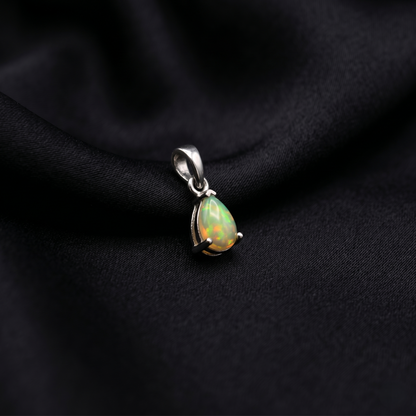 Elegant Pear-Cut Natural Opal Silver Pendant