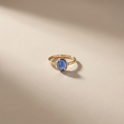 Oval Blue Cabochon Gold Solitaire Ring