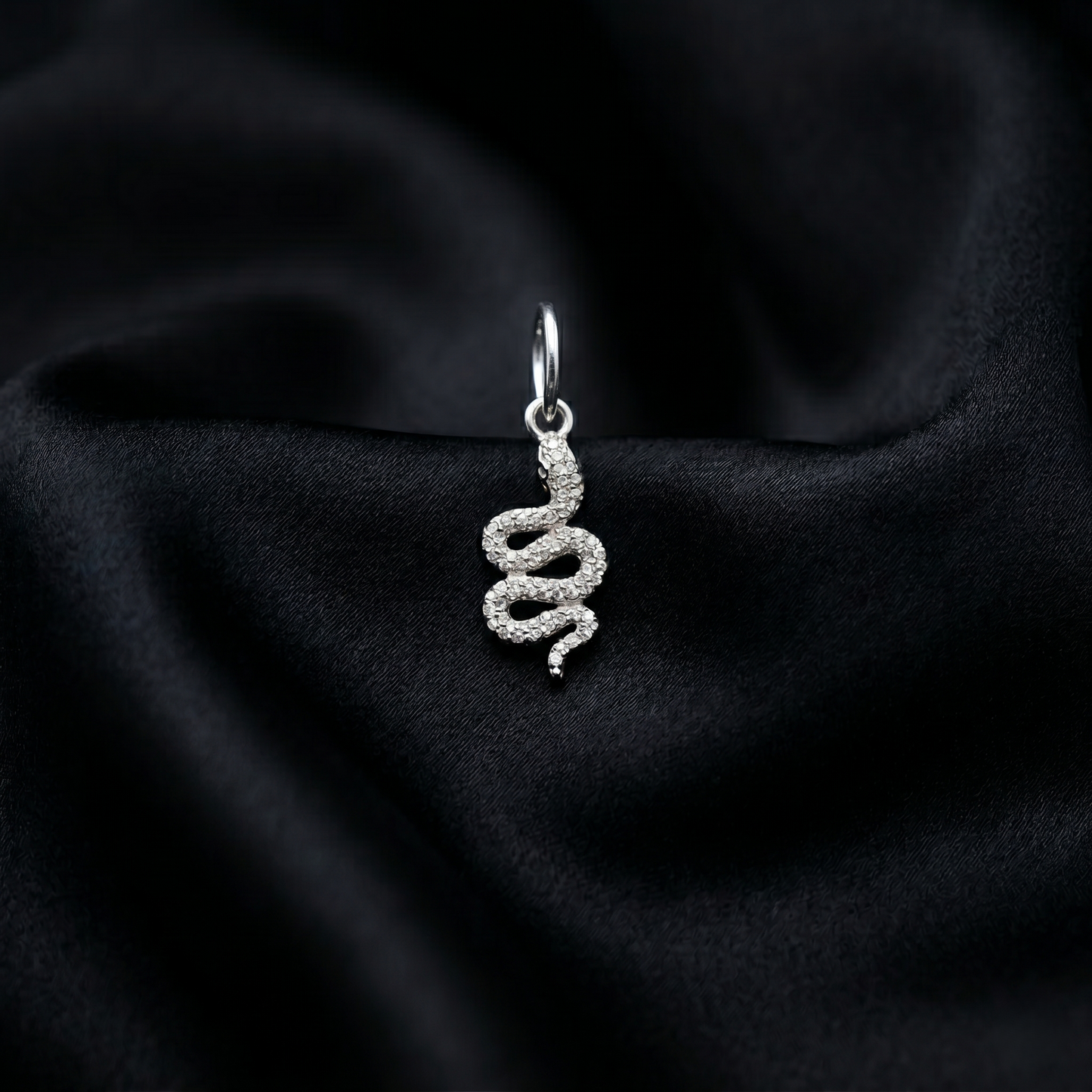 The Serpentine Silver Diamond Pendant
