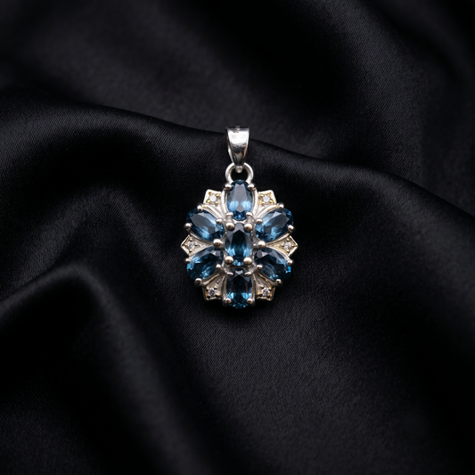 Elegant Silver Floral Blue Topaz Pendant
