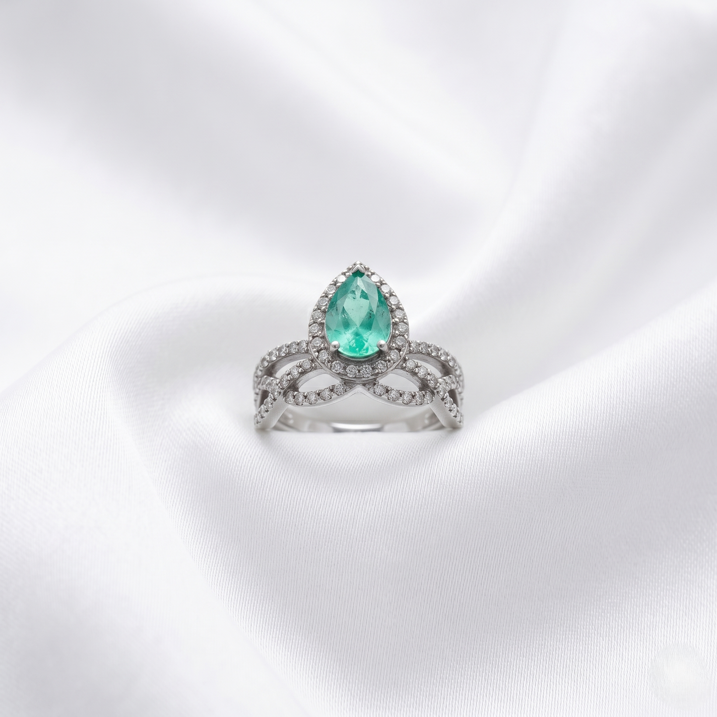 Pear Cut Emerald Halo Gold Ring