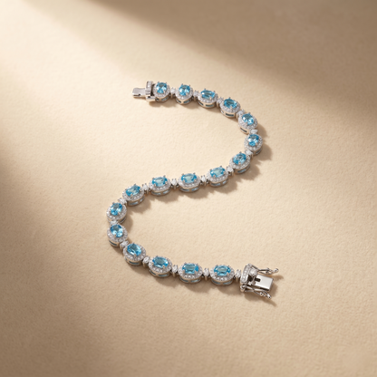 Elegant Blue Topaz Silver Halo Bracelet