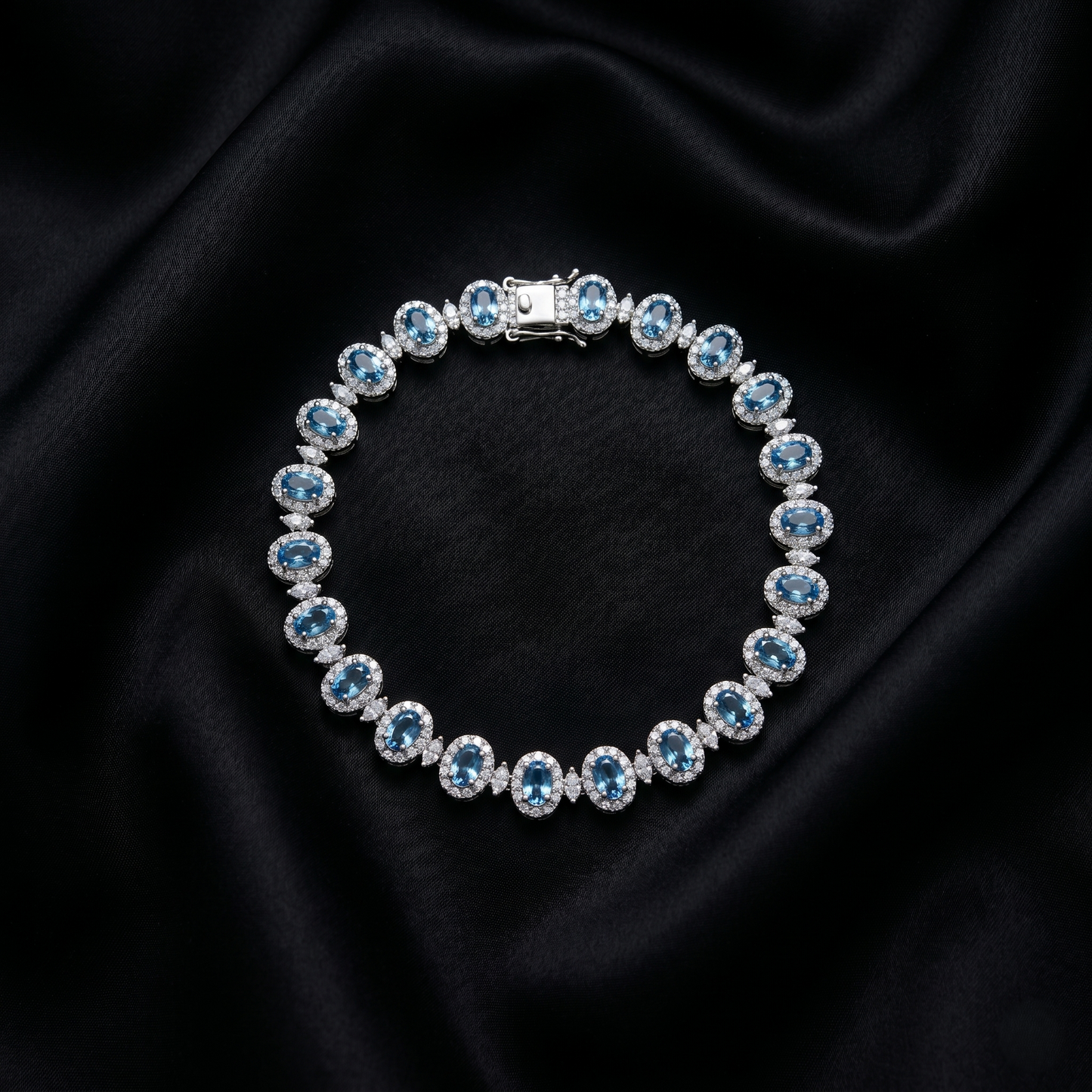 Elegant Blue Topaz Silver Halo Bracelet