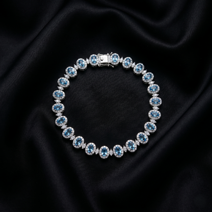 Elegant Blue Topaz Silver Halo Bracelet