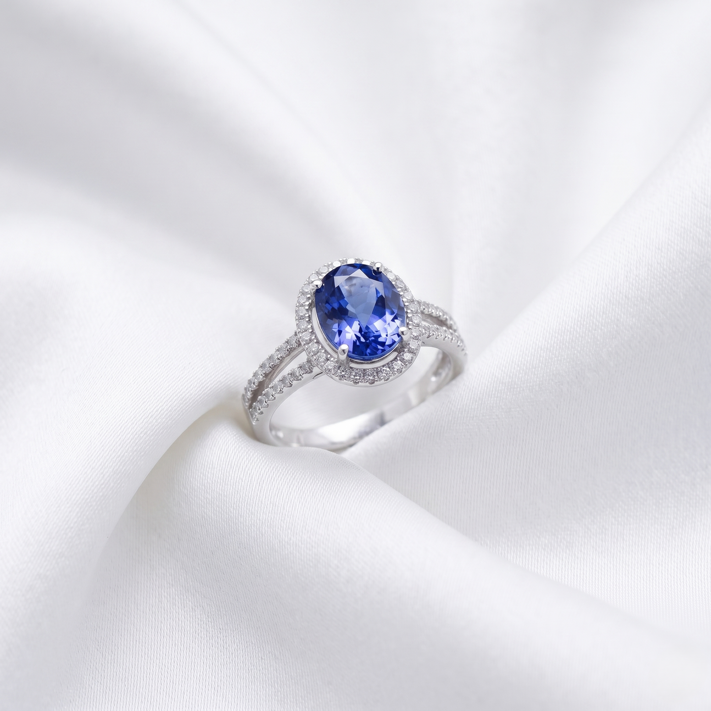 Oval Sapphire Diamond Halo Ring