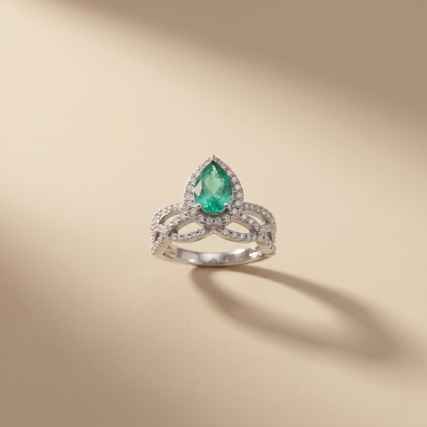 Pear Cut Emerald Halo Gold Ring
